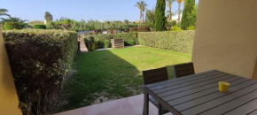 Luminoso y tranquilo bajo con Jardin en campo de Golf Valle del Este